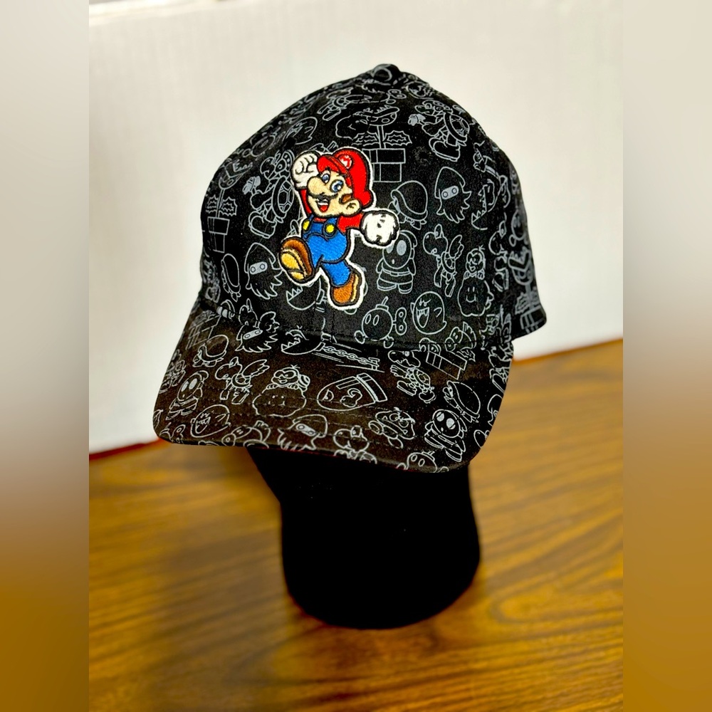 Super Mario Black Cap good condition. Embroidered logo Stretch fit